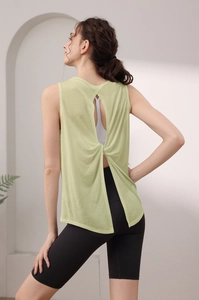 Detail of light green sports vest with stylish twisted open back design for yoga