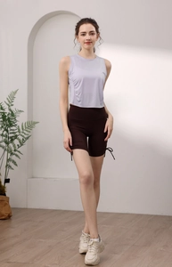Detail view of purple sleeveless sports vest with side ruching for slim fit