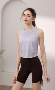 Detail of lavender slim-fit tencel sports tank top and brown high-waist shorts set