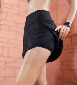 Detail view of black high-waisted double-layer sports shorts for running and gym workouts