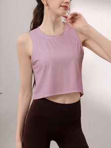 Haut court de sport côtelé pour femme en rose pâle pour le yoga et le fitness