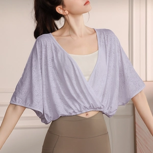 Short lavender jacquard yoga top with batwing sleeves and cross V-neck design