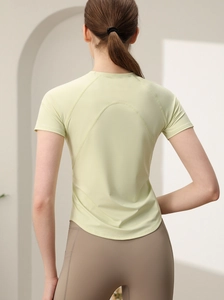 T-shirt sportiva da donna a asciugatura rapida in verde chiaro con maniche raglan e orlo