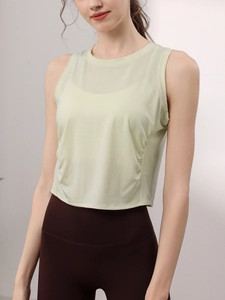 Slim fit tencel yoga tank top for women in light green with side ruched details