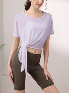 Haut de sport ample lilas pour yoga avec nœud latéral réglable et tissu respirant léger