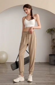 Women's high waist nylon cargo joggers with drawstring waist and pockets for yoga