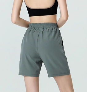 Back view of high-waisted dark grey sports shorts for women running and yoga fitness