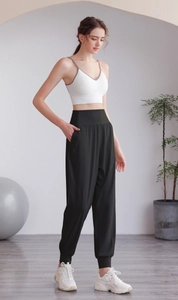 Pantaloni sportivi neri a vita alta da donna con tasche per yoga e allenamento fitness
