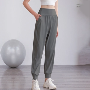 Pantaloni da yoga a vita alta grigio scuro da donna con tasche laterali e polsini a coste
