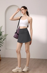 Detail showing the inner lining and elastic fabric of a high-waisted sports skort