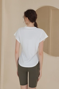 Rear view of white quick-dry fitness T-shirt and olive green high-waist yoga shorts