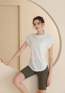 Slim fit breathable short sleeve yoga top with curved hem and olive green cycling shorts