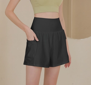 Detail der High-Waist Yoga-Shorts mit Seitentasche für Handy und elastischem Bauchwegbund