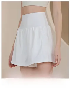 Detail of white high-waisted sports shorts featuring a breathable built-in liner