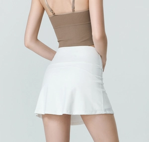 Rear view of white high-waisted tennis skort showing the athletic fit and A-line silhouette
