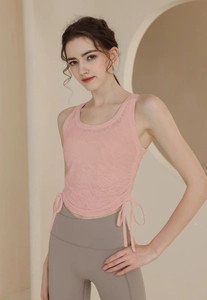 Gilet de sport en nylon rose avec texture jacquard et cordons latéraux pour le yoga