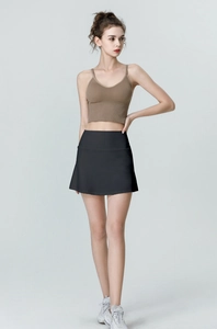 Detailed view of women high waisted sports skort with functional side pocket for tennis