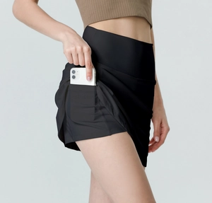 Detail view of athletic skirt with hidden side pocket for smartphone storage during sports