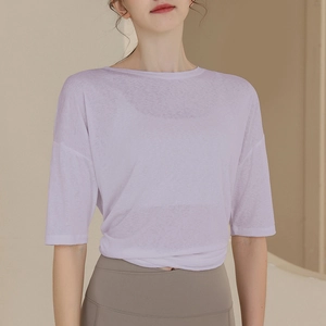 Loose lavender yoga top with breathable mesh fabric and waist twist detail for women
