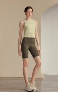 Détail du débardeur de sport en jacquard montrant le tissu respirant et sa texture