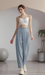 Relaxed fit light blue high waisted yoga joggers styled with a white rib sports bra
