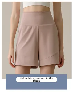 Detail of high-waisted nylon sports shorts featuring smooth fabric and curved side seams