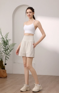 Women's high-waisted loose gym shorts with side stripe detail in ivory white