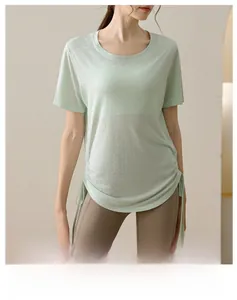 Detailed texture of light green tencel snowflake yoga top with side drawstrings