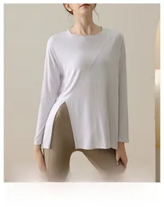 Detail view of the modal yoga top with side slit and customizable length design