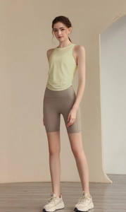 Detail of light yellow jacquard tank top with honeycomb breathable texture for yoga