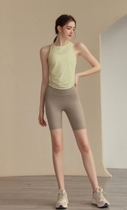 Detail view of jacquard yoga tank top with side ruching and mesh breathable texture
