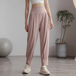 Women's high waist nylon joggers in mauve pink for yoga and loose fit athletic wear