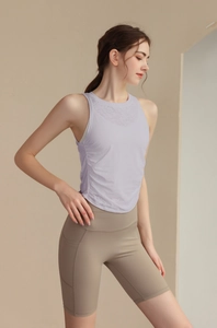 Side view of a slim lavender jacquard yoga tank top with stylish ruched side details