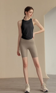 Close-up of jacquard breathable nylon tank top with high-waist yoga shorts for fitness
