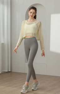 Haut de yoga ample anti-UV avec manches longues en maille respirante couleur jaune
