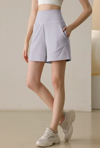 Close-up of high-waisted athletic shorts with side pockets and quick-dry fabric