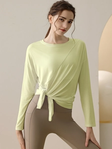 Light green long sleeve modal sports top with side-tie knot for yoga and fitness training