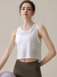 Débardeur de sport court blanc pour femme avec motif géométrique ajouré pour le yoga