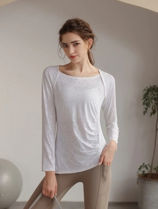 Close-up of white breathable jacquard yoga top with drawstring ruched side details