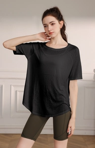 Close-up of black breathable t-shirt with side slits and quick-dry honeycomb texture