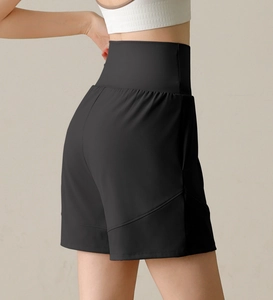 Rear view of high-waisted black athletic shorts with breathable fabric and seam details