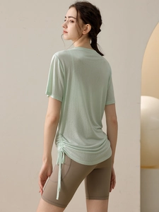 Short sleeve mint yoga t-shirt with adjustable side drawstring and lightweight fabric