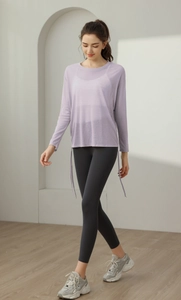 Relaxed lavender yoga cover-up with drawstring sides and grey leggings set detail