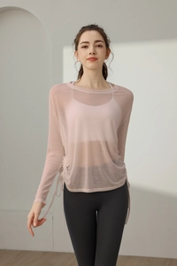 Detail of light pink mesh sports cover-up with side drawstring for yoga fitness