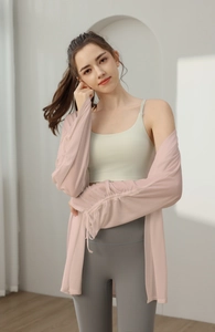 Pink long sleeve sheer cover-up yoga jacket with drawstring cuff detail for women