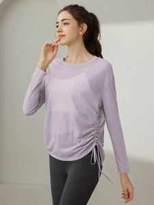 Women's light purple long sleeve sports yoga top with adjustable side drawstring details