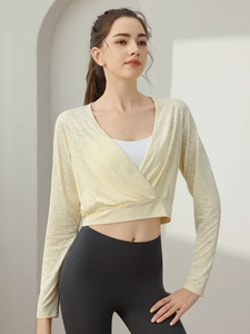 Light yellow wrap gym top for women with long sleeves and cross v-neck minimalist design