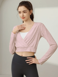 Women's pink long sleeve yoga top with V-neck wrap design for fitness and running