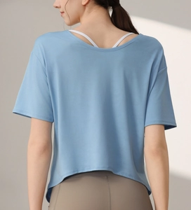Close-up of light blue burnout camo sport tee with a deep V-back showing mesh texture