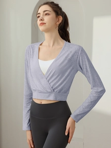 Lilac jacquard long sleeve yoga top with a cropped cross-front V-neck design for fitness